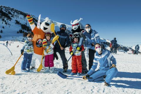 World snow day mascots playing with children